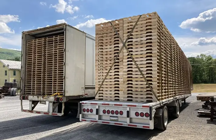 pallets loaded onto trucks